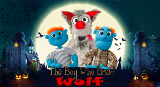 photo of puppets from Halloween version of Boy Who Cried Wolf show in front of a full moon with bats flying near their heads