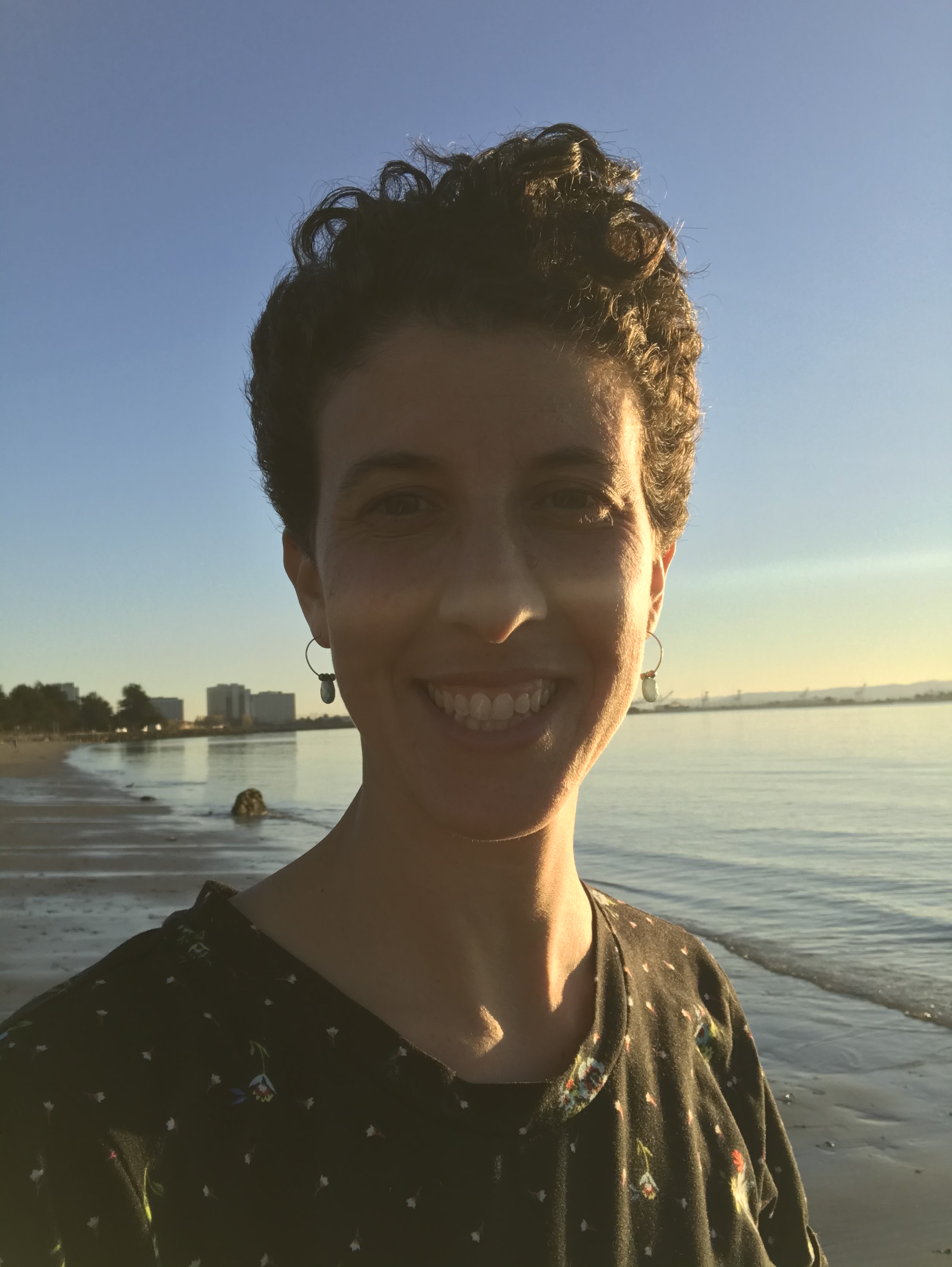 close up photo of yoga teacher Angela Madonia on the beach