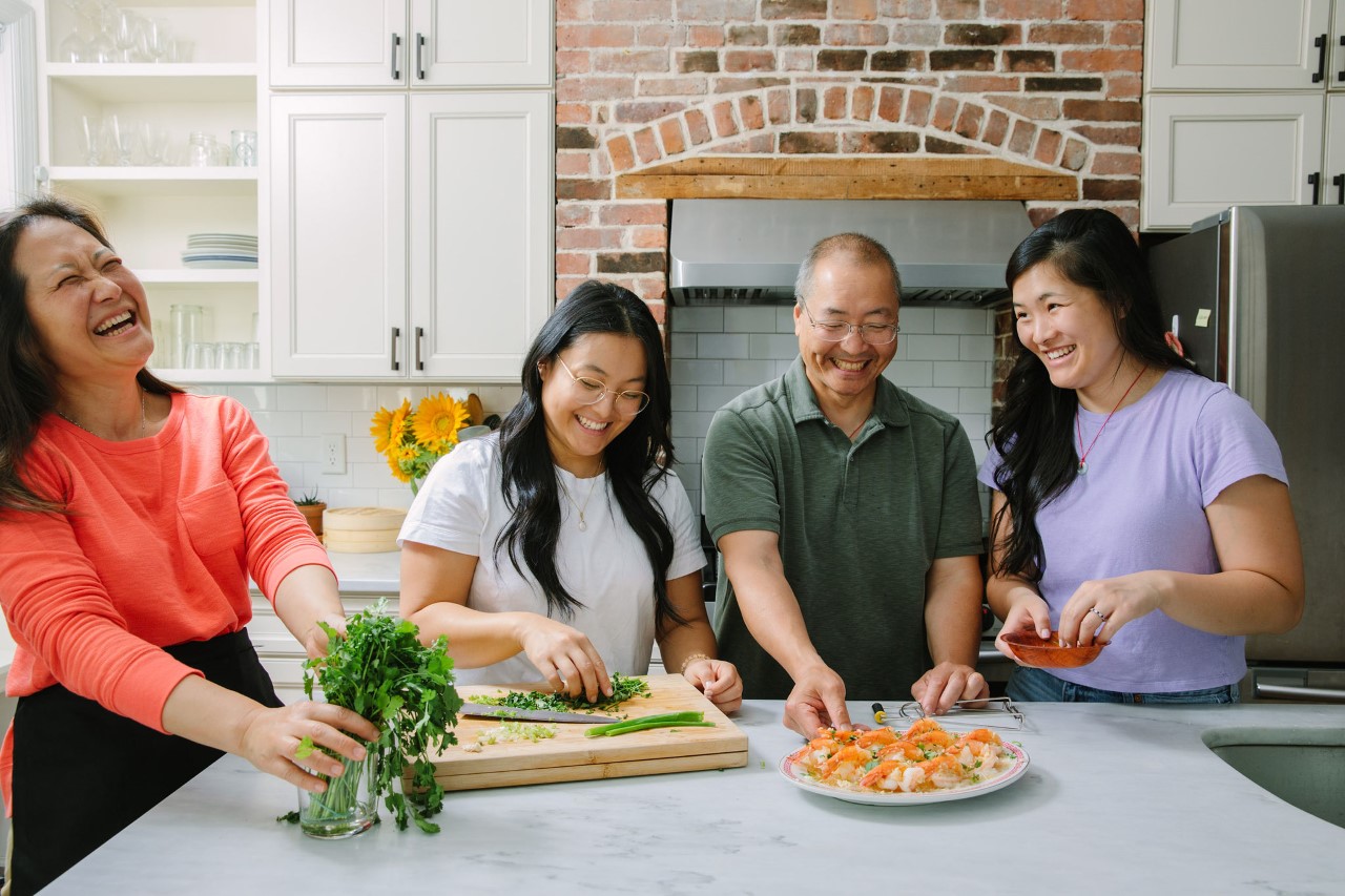 Leung family cooking together