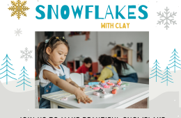 Child working with Clay at a table with Snowflakes in the background.