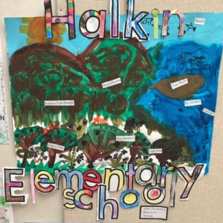 Photo a student-made poster from Halkin Elementary School in San Leandro showcasing Chochenyo words (including the school name and native plant names)