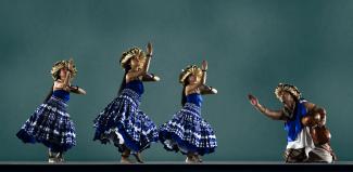 photo of four dancers from Halau O'Keikiali'i