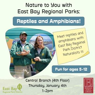 Beige flyer with photograph of two park rangers holding a snake and a small lizard and smiling at the camera